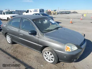 2004 Kia Rio with VIN KNADC125246339415, listed as a IAAI auction lot 41978078 with 127,727 mi miles. Bid and sale history available at carsss.com. Image 1.