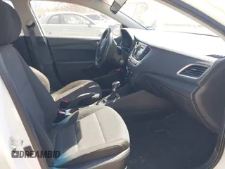 2018 Hyundai Accent SE with VIN 3KPC24A37JE026210, listed as a IAAI auction lot 41753981 with 136,056 mi miles. Bid and sale history available at carsss.com. Image 5.