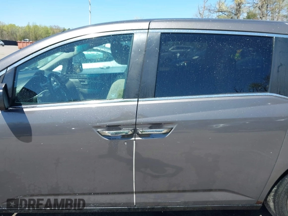2012 Honda Odyssey EX-L with VIN 5FNRL5H68CB006686, listed as a IAAI auction lot 42039035 with 338,331 mi miles and . Bid and sale history available at carsss.com. Image 14.