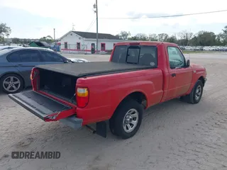 2002 Mazda B-Series 2WD Truck SX with VIN 4F4YR12D62TM23429, listed as a IAAI auction lot 41646076 with 97,360 mi miles. Bid and sale history available at carsss.com. Image 4.