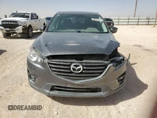 2016 Mazda CX-5 Touring with VIN JM3KE2CY8G0902825, listed as a Copart auction lot 49662515 with 78,580 mi miles and Salvage Title. Bid and sale history available at carsss.com. Image 5.