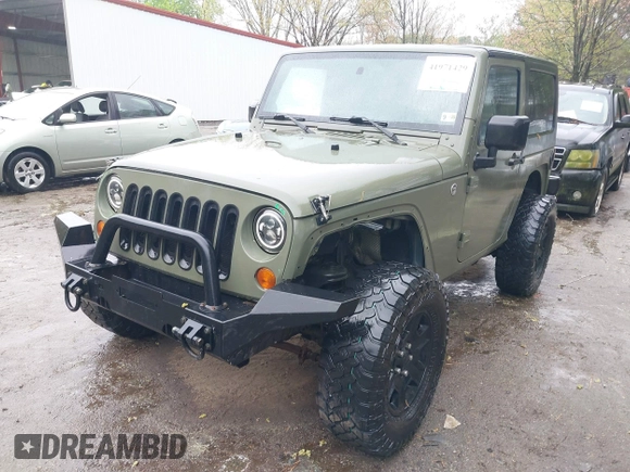 2007 Jeep Wrangler X with VIN 1J4FA24127L231409, listed as a IAAI auction lot 41971429 with 181,855 mi miles and . Bid and sale history available at carsss.com. Image 17.