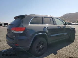 2014 Jeep Grand Cherokee Laredo with VIN 1C4RJEAG7EC212915, listed as a Copart auction lot 51571855 with 169,851 mi miles and Clean Title. Bid and sale history available at carsss.com. Image 3.