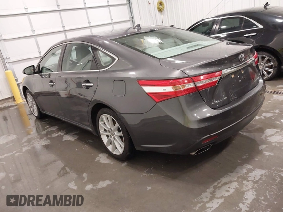 2014 Toyota Avalon Limited with VIN 4T1BK1EBXEU114134, listed as a IAAI auction lot 41727586 with 117,592 mi miles and . Bid and sale history available at DreamBid. Image 3.