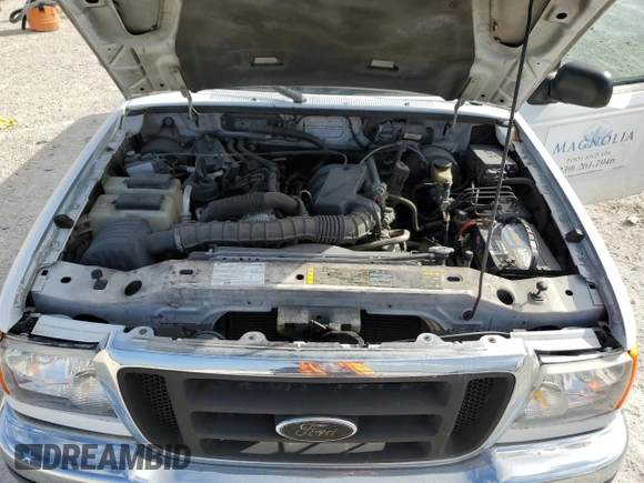 2005 Ford Ranger XLT z VIN 1FTYR44U15PA77388, wystawiony jako Copart lot #47502505 z przebiegiem 153 089 mil mil oraz Czysty tytuł • Clean title. Historia ofert i sprzedaży dostępna na DreamBid. Obrazek 11.