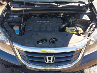 2010 Honda Odyssey EX-L with VIN 5FNRL3H76AB058912, listed as a IAAI auction lot 41558361 with 206,841 mi miles and . Bid and sale history available at DreamBid. Image 10.