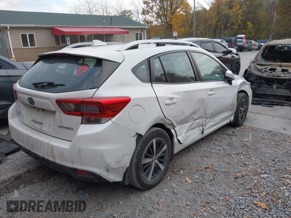2020 Subaru Impreza Premium z VIN 4S3GTAV65L3706134, wystawiony jako IAAI lot #40711288 z przebiegiem 56 288 mil mil oraz . Historia ofert i sprzedaży dostępna na DreamBid. Obrazek 4.