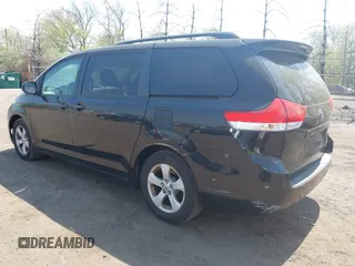 2011 Toyota Sienna LE AAS with VIN 5TDKK3DC4BS173688, listed as a IAAI auction lot 42106211 with 282,301 mi miles. Bid and sale history available at carsss.com. Image 3.