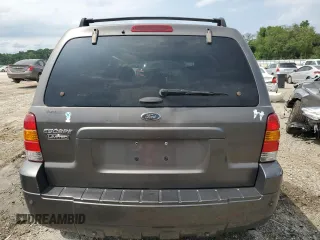 2005 Ford Escape Limited with VIN 1FMYU04115KA63383, listed as a Copart auction lot 59706164 with 212,167 mi miles and Salvage Title. Bid and sale history available at carsss.com. Image 6.