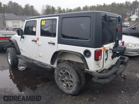 2014 Jeep Wrangler Unlimited Rubicon with VIN 1C4BJWFG9EL274851, listed as a IAAI auction lot 41946440 with 1 mi miles. Bid and sale history available at carsss.com. Image 3.