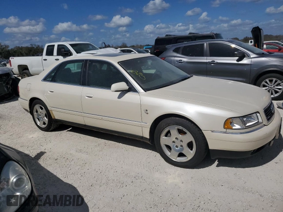 2000 Audi A8 with VIN WAUFL54D5YN006447, listed as a Copart auction lot 77151504 with Not provided miles and Salvage title. Bid and sale history available at DreamBid. Image 4.
