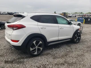 2018 Hyundai Tucson Sport with VIN KM8J33AL6JU735948, listed as a Copart auction lot 56232395 with 126,878 mi miles and Clean title. Bid and sale history available at DreamBid. Image 3.