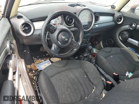 2011 MINI Hardtop with VIN WMWSU3C52BT094399, listed as a Copart auction lot 56561635 with 94,428 mi miles and Salvage Title. Bid and sale history available at DreamBid. Image 8.