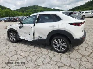 2023 Mazda CX-30 S Preferred with VIN 3MVDMBCM4PM511815, listed as a Copart auction lot 64192945 with Not provided miles and Salvage title. Bid and sale history available at DreamBid. Image 2.