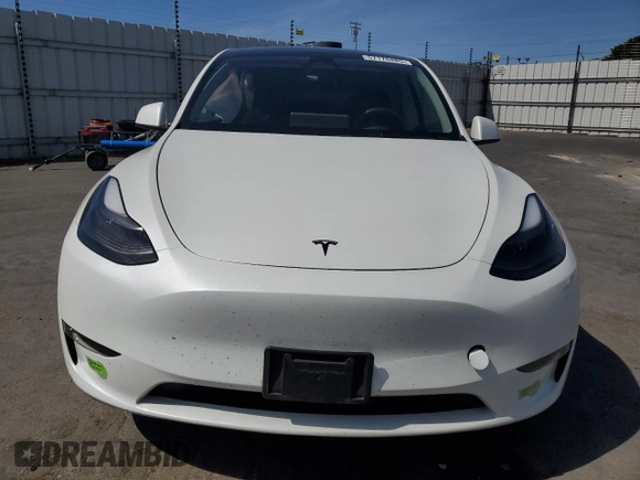 2023 Tesla Model Y Long Range z VIN 7SAYGDEE8PF816544, wystawiony jako Copart lot #57170485 z przebiegiem 74 598 mil mil oraz Szkoda całkowita • Salvage title. Historia ofert i sprzedaży dostępna na DreamBid. Obrazek 5.