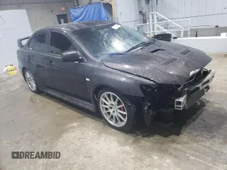 2014 Mitsubishi Lancer Evolution GSR with VIN JA32W8FV5EU017979, listed as a Copart auction lot 47222615 with 109,632 mi miles and Salvage Title. Bid and sale history available at carsss.com. Image 4.