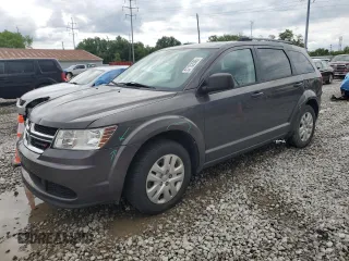 2017 Dodge Journey SE z VIN 3C4PDCAB1HT709104, wystawiony jako Copart lot #57132935 z przebiegiem 89 024 mil mil oraz Szkoda całkowita • Salvage title. Historia ofert i sprzedaży dostępna na DreamBid. Obrazek 1.
