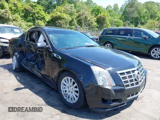 2012 Cadillac CTS Luxury z VIN 1G6DF5E59C0147796, wystawiony jako IAAI lot #42181195 z przebiegiem 169 738 mil mil oraz . Historia ofert i sprzedaży dostępna na DreamBid. Obrazek 1.