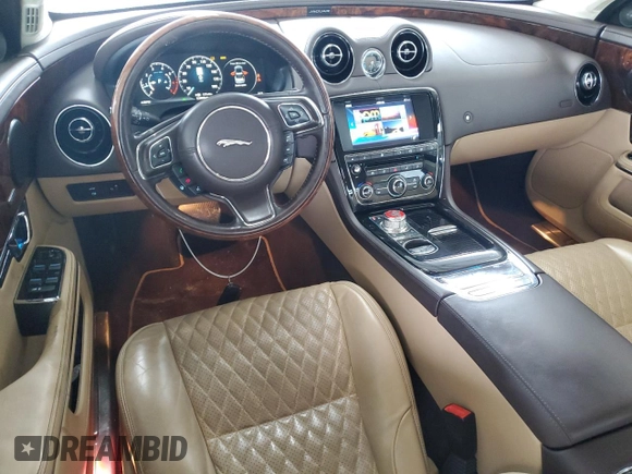 2016 Jaguar XJ Portfolio with VIN SAJWA2G70G8V93006, listed as a Copart auction lot 52324635 with 123,690 mi miles and Salvage Title. Bid and sale history available at DreamBid. Image 8.