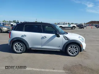 2016 MINI Countryman S z VIN WMWZC5C57GWU00192, wystawiony jako IAAI lot #42345660 z przebiegiem 57 683 mil mil oraz . Historia ofert i sprzedaży dostępna na DreamBid. Obrazek 13.