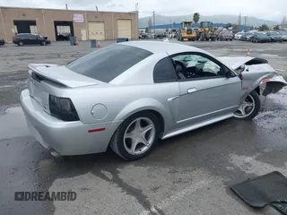 1999 Ford Mustang GT with VIN 1FAFP42X0XF215981, listed as a IAAI auction lot 41806677 with 152,295 mi miles. Bid and sale history available at carsss.com. Image 4.