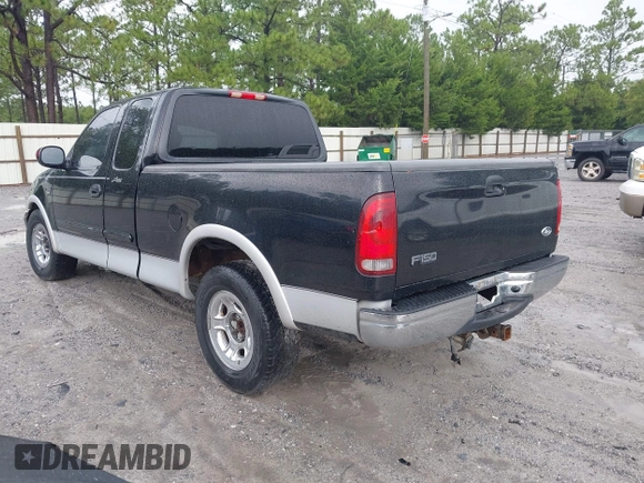 2003 Ford F-150 XL with VIN 1FTRX17L13NA01819, listed as a IAAI auction lot 42719787 with Not provided miles and . Bid and sale history available at DreamBid. Image 3.
