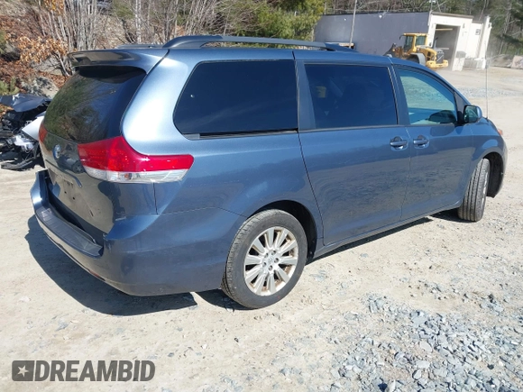 2014 Toyota Sienna LE with VIN 5TDJK3DC4ES087457, listed as a IAAI auction lot 41773128 with 103,993 mi miles and . Bid and sale history available at DreamBid. Image 4.