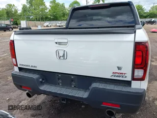 2021 Honda Ridgeline Sport with VIN 5FPYK3F14MB005117, listed as a IAAI auction lot 42343059 with 58,862 mi miles and . Bid and sale history available at DreamBid. Image 16.