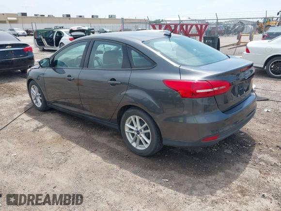 2016 Ford Focus SE with VIN 1FADP3F21GL387227, listed as a IAAI auction lot 42438650 with 59,969 mi miles and . Bid and sale history available at DreamBid. Image 3.