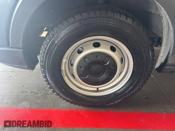2023 Ford Transit Cargo with VIN 1FTBR1X86PKC09421, listed as a IAAI auction lot 42796097 with 10,233 mi miles and . Bid and sale history available at DreamBid. Image 17.