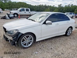 2014 Mercedes-Benz C 250 Sport with VIN WDDGF4HB3EG235314, listed as a Copart auction lot 60934285 with 99,679 mi miles and Salvage title. Bid and sale history available at DreamBid. Image 1.