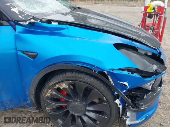 2021 Tesla Model Y Performance z VIN 5YJYGDEF8MF209819, wystawiony jako IAAI lot #41757009 z przebiegiem 37 685 mil mil oraz . Historia ofert i sprzedaży dostępna na DreamBid. Obrazek 6.