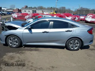 2017 Honda Civic LX z VIN 2HGFC2F53HH513655, wystawiony jako IAAI lot #41968212 z przebiegiem 112 672 mil mil oraz . Historia ofert i sprzedaży dostępna na DreamBid. Obrazek 14.