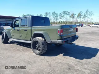 2022 Jeep Gladiator High Altitude with VIN 1C6HJTFG3NL141891, listed as a IAAI auction lot 41738578 with 38,133 mi miles and . Bid and sale history available at DreamBid. Image 3.
