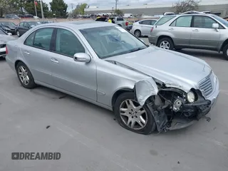 2003 Mercedes-Benz E-Class 3.2L with VIN WDBUF65J13A340727, listed as a IAAI auction lot 41853687 with 238,004 mi miles. Bid and sale history available at carsss.com. Image 1.