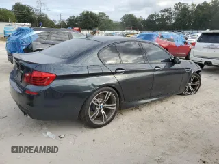 2016 BMW M5 z VIN WBSFV9C51GD595430, wystawiony jako Copart lot #79675834 z przebiegiem 82 351 mil mil oraz Szkoda całkowita • Salvage title. Historia ofert i sprzedaży dostępna na DreamBid. Obrazek 3.