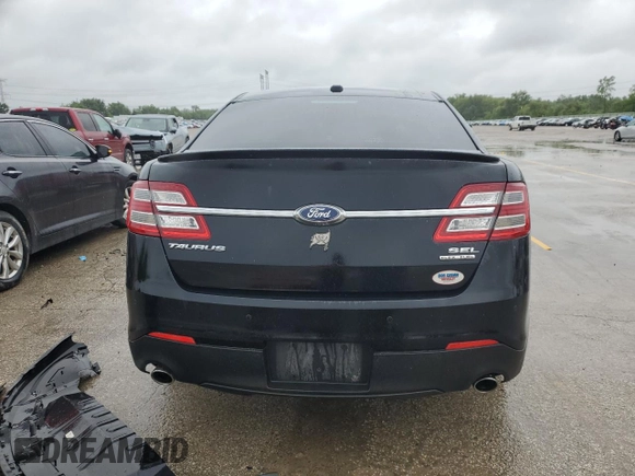 2016 Ford Taurus SEL z VIN 1FAHP2E83GG148885, wystawiony jako Copart lot #59760575 z przebiegiem 135 579 mil mil oraz Szkoda całkowita • Salvage title. Historia ofert i sprzedaży dostępna na DreamBid. Obrazek 6.