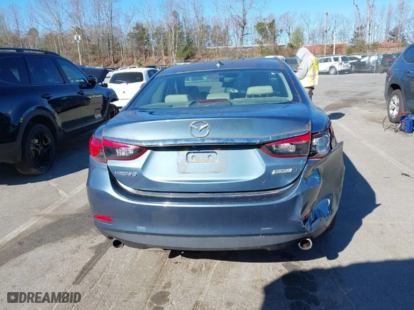 2017 Mazda Mazda6 Touring with VIN JM1GL1V53H1115472, listed as a IAAI auction lot 41854231 with 147,895 mi miles. Bid and sale history available at carsss.com. Image 16.