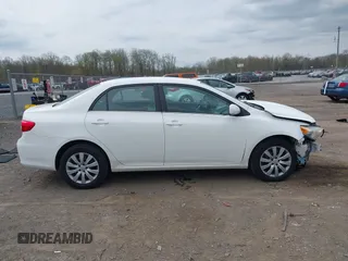 2013 Toyota Corolla L with VIN 2T1BU4EE7DC046672, listed as a IAAI auction lot 42142984 with 144,762 mi miles. Bid and sale history available at carsss.com. Image 14.