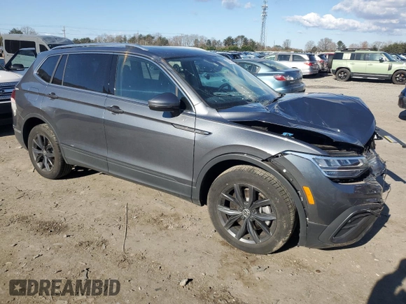 2023 Volkswagen Tiguan SE with VIN 3VVMB7AX9PM018778, listed as a Copart auction lot 50565555 with 9,758 mi miles and Salvage Title. Bid and sale history available at DreamBid. Image 4.