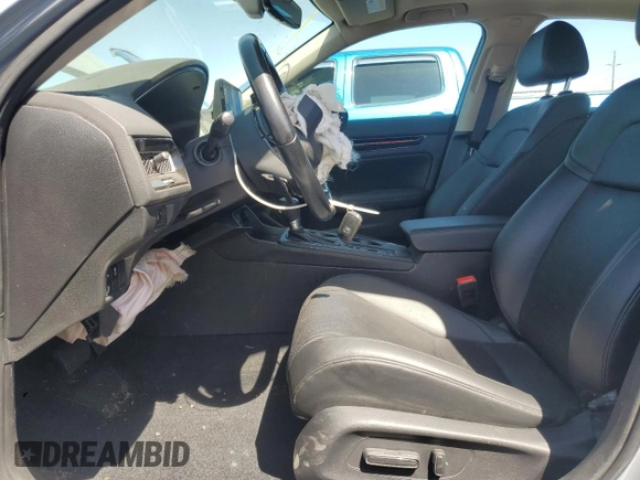 2022 Honda Civic Touring with VIN 2HGFE1F90NH319961, listed as a Copart auction lot 57799335 with 36,458 mi miles and Salvage title. Bid and sale history available at DreamBid. Image 7.