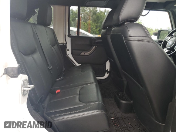 2018 Jeep Wrangler Unlimited Sahara with VIN 1C4BJWEG2JL851277, listed as a Copart auction lot 63631645 with 83,851 mi miles and Salvage title. Bid and sale history available at DreamBid. Image 10.