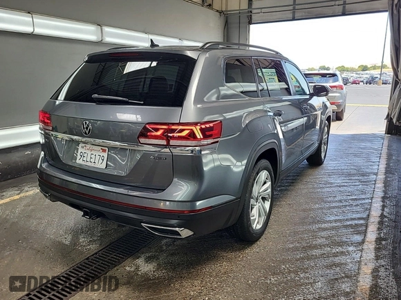 2023 Volkswagen Atlas SE z VIN 1V2HR2CA5PC526012, wystawiony jako IAAI lot #42796408 z przebiegiem 41 216 mil mil oraz . Historia ofert i sprzedaży dostępna na DreamBid. Obrazek 44.