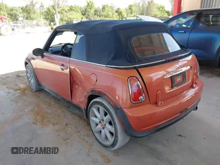 2005 MINI Convertible with VIN WMWRF334X5TF61026, listed as a IAAI auction lot 42125720 with 117,908 mi miles and . Bid and sale history available at DreamBid. Image 3.