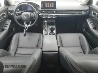 2023 Honda Civic Touring z VIN 2HGFE1F96PH311589, wystawiony jako Copart lot #58594035 z przebiegiem 17 762 mil mil oraz Szkoda całkowita • Salvage title. Historia ofert i sprzedaży dostępna na DreamBid. Obrazek 8.