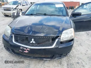 2011 Mitsubishi Galant FE z VIN 4A32B2FF9BE028621, wystawiony jako IAAI lot #41788773 z przebiegiem 261 300 mil mil oraz . Historia ofert i sprzedaży dostępna na DreamBid. Obrazek 6.
