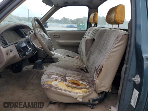 1994 Toyota T100 DX with VIN JT4VD10A6R0017701, listed as a Copart auction lot 46034975 with 219,651 mi miles and Salvage Title. Bid and sale history available at DreamBid. Image 7.