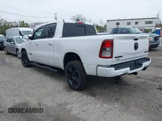 2021 Ram 1500 Big Horn with VIN 1C6SRFFT1MN721561, listed as a IAAI auction lot 42017023 with 62,023 mi miles and . Bid and sale history available at DreamBid. Image 3.
