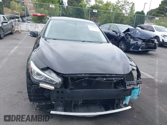 2015 Infiniti Q50 z VIN JN1BV7AP3FM336566, wystawiony jako IAAI lot #42349544 z przebiegiem 84 077 mil mil oraz . Historia ofert i sprzedaży dostępna na DreamBid. Obrazek 13.