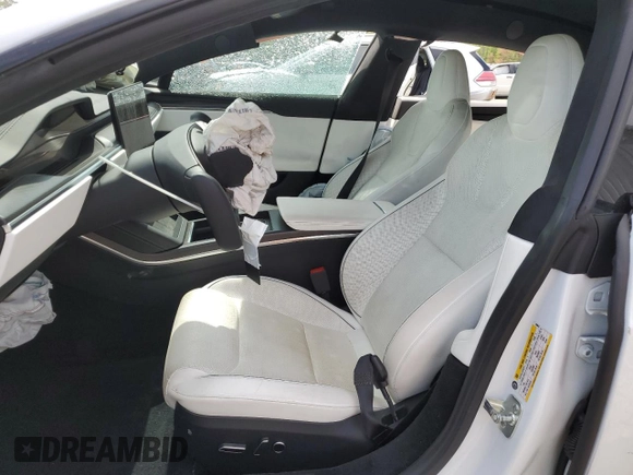 2022 Tesla Model S Plaid with VIN 5YJSA1E63NF460643, listed as a Copart auction lot 54665505 with Not provided miles and Salvage title. Bid and sale history available at DreamBid. Image 7.